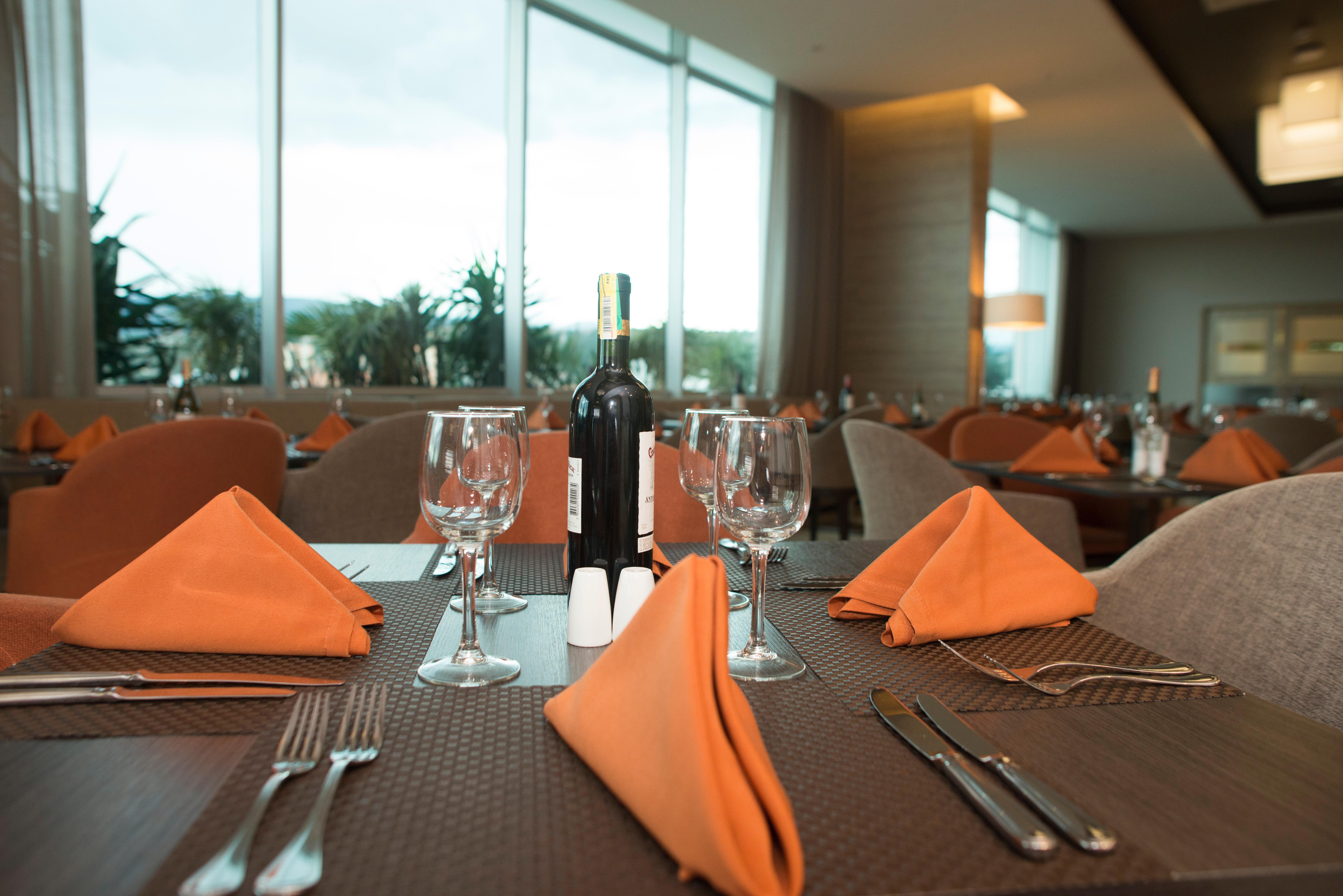 Holiday Inn Cucuta By Ihg Экстерьер фото A table set for fine dining